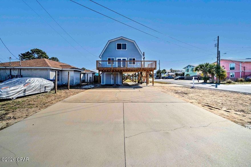 You will be shocked by the recent transformation of this home! Welcome to the fresh face-lift of this unique 3 Bedroom-2 Bath home on a corner lot South of the Grand Lagoon in fabulous Panama City Beach - It has a coveted 19 x 3 foot workshop/gym/or golf cart garage on the ground level.  With plenty of parking spaces, this home happens to be 3 short blocks to the sand and surf.  Whether it is your future home, your second home, or your rental investment, you will be a proud owner.  Enjoy the updates while loving the location! Close to St Andrews State Park, to boating, and to popular restaurants, you can find plenty to do close to home. No HOA fees to pay and no mandatory Flood Insurance  required in Zone X-