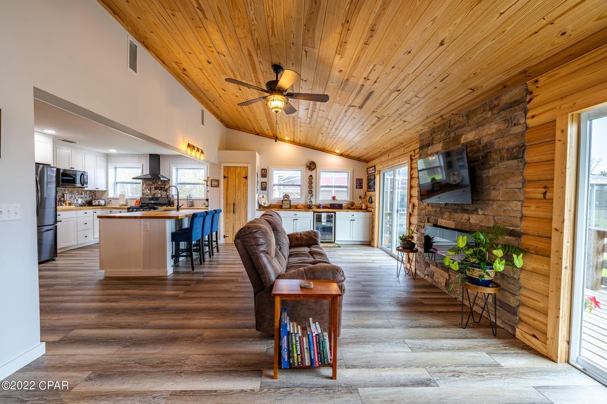 CURRENTLY UNDER CONTRACT, SELLER ACCEPTING BACKUP OFFERS. Treat yourself to spacious living with this newly renovated 3 bedroom, 2 bathroom home (plus a separate 1/1 mother in law suite) on 10 acres. As you walk in, you'll notice how open and airy it is with plenty of natural light flowing throughout the home. 

The master bedroom has a beautiful cedar lined closet, and the master bathroom features dual sinks, a stand up shower, and a soaking tub. The additional two bedrooms offer plenty of space for sleep and study. 

Imagine yourself entertaining family and friends in the great open kitchen and living area. This kitchen features new stainless steel appliances, an eat-in island, custom cabinets, and beautiful butcher block countertops. The bedroom is quite large and has a ton of closet space. The Suite also features a stand up shower in the bathroom, and a decked out kitchen with a gas stove and stainless steel appliances! 

You'll find the outdoor space by the pool perfect for entertaining. It has a full screen enclosure with an amazing seating area that's partially covered, for those warm sunny days where you'll want to take a dip and relax in the shade. You'll also find that the two ponds on the property are great for fishing and stay stocked with catfish and brim. 
This property has plenty of parking with a detached two car garage, covered RV parking, and a covered area to park alongside the large workshop.