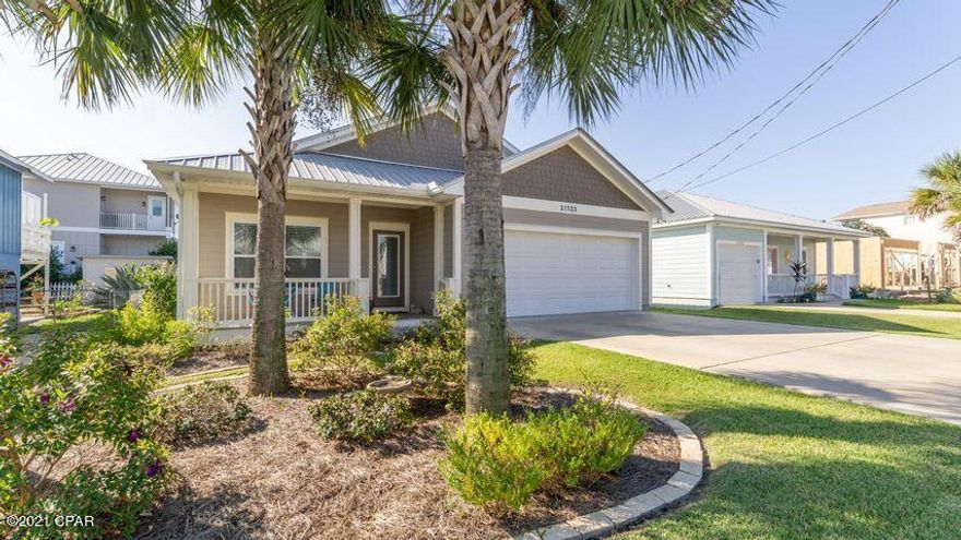 A beautiful and well kept west end home walking distance to the beach & a short drive to Pier Park, Inlet Beach & 30-A. Interior features include vinyl plank flooring throughout, with tile flooring in Master bathroom, Stainless steel appliances, granite counter tops in kitchen & bathrooms. Master bath has separate shower & tub. This home has Anderson Low E windows, Therma Tru doors, Rheem Heating & cooling, Metal roof with gutters, Hardi Board siding, hurricane rated garage door & hurricane storm shutters for all windows. Covered porches in both front and rear, plus an additional paved area with hot tub included. Sprinkler system and fully fenced back yard. Furniture and personal items do not convey