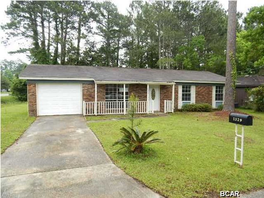 Charming ranch home offers a spacious backyard w/outbuilding, formal living room, kitchen/dining combo w/garage access, laundry closet, and pretty wood cabinets, and spacious bedrooms that include a master suite w/half bath. Located just south of Tyndall Pkwy, this home offers tons of everyday amenities and easy access to public schools and the downtown area! EQUAL HOUSING OPPORTUNITY.