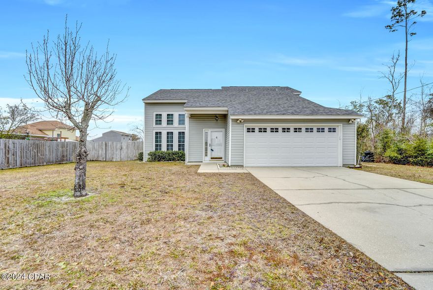 CURRENTLY UNDER CONTRACT, SELLER WILL CONSIDER BACKUP OFFERS. Welcome to your new home near Tyndall Air Force Base! This charming residence offers a perfect blend of comfort and convenience. With 3 bedrooms and 2 bathrooms, this lovely home provides ample space for families and individuals alike.
As you step inside, you'll be greeted by the grandeur of vaulted ceilings, adding a touch of elegance to the living space. The master bedroom on the first floor is a true retreat, featuring an attached bonus space that leads to the backyard patio. Imagine enjoying your morning coffee in this private oasis or hosting gatherings with friends and family.
The large fenced-in backyard is a standout feature, offering both privacy and security. It's an ideal space for children to play, pets to roam freely, or for entertaining guests. The patio is perfect for outdoor dining, and the additional bonus room upstairs provides versatility for a home office, gym, or entertainment area.
For those who love to tinker or need extra storage, the spacious 2-car garage and large shed in the backyard provide ample space for all your needs.
Nestled in a quaint neighborhood, this home is conveniently located near Tyndall Air Force Base. Enjoy the ease of access to restaurants, shopping, schools, and entertainment, making it a perfect location for those seeking both comfort and convenience.
Don't miss the opportunity to make this delightful property your own. Schedule a showing today and experience the charm and practicality that this home near Tyndall Air Force Base has to offer!