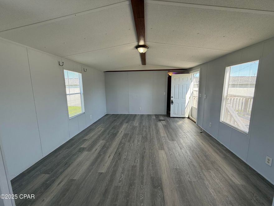 Located on the east end of Panama City Beach, this home offers quick access to great local restaurants and bars as well as just a few minute drive to one of the most beautiful beaches on earth. With no HOA fee, this home is affordable and is a great opportunity as an investment property for a short term or long term rental. The plot of land is a massive quarter acre with a large poured driveway.