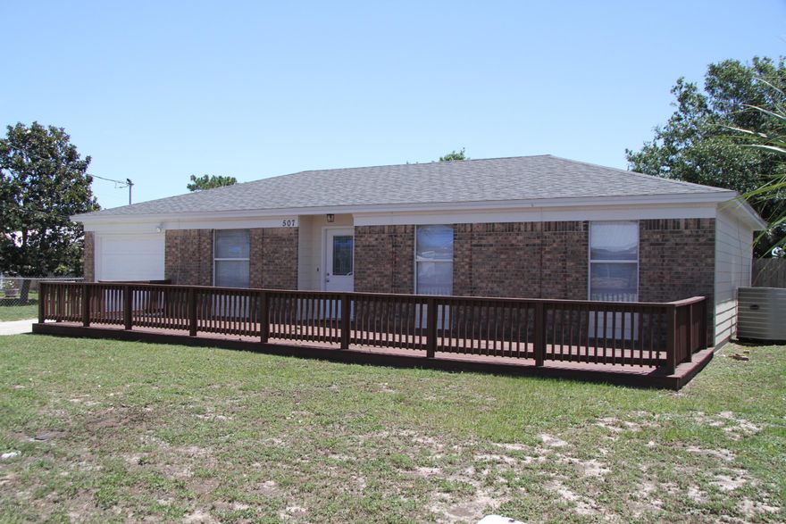 LOCATION LOCATION LOCATION, Just a few blocks from the beach!!! Golf cart friendly community so you can cart your way to the beach and local area attractions, restaurants and shopping.  This home has a brand new roof, freshly painted inside and out, new light fixtures and more.  It's move in ready and SO close to the beach! The back yard is HUGE and could easily accommodate a pool and yard buildings. This home, remodeled in 2014, also has an updated kitchen with black appliances, a bar height breakfast counter, tile floors, and three roomy bedrooms.  A new HVAC was installed in 2015, and the exterior is a hardy cement siding and the front all brick. There is even a large gated deck in the front of the home with plenty of room for outdoor seating to enjoy the gulf breezes.  HURRY! A block from Beach Elementary, this low maintenance lifestyle home is ready for a new family today!