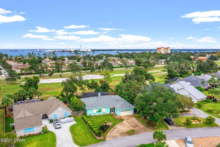 One of the better neighborhoods to invest in right now. The St Joe Company that is known for bringing big values to neighborhoods like WaterColor, WaterSound, Lattitudes and just too many to list; is rebuilding the Bay Point Marina that will reopen early 2022. This will be one of the best full service marinas on the Emerald Coast of Florida. So hurry up and buy low and watch your property values sky rocket. Come see this Florida Style Home before it is SOLD! Lots of bright natural light and space .Nestled in the wonderful neighborhood of Bay Point. Living in Bay Point is so much fun! Lots of neighborhood events and amenities including the Famous Jack Nicklaus Golf Course, restaurants, summer concert series in the park, monthly farmers market. This home offers natural gas HEATED POOL & SPA, two casual dining areas. New kitchen with huge island with soft-close custom cabinets on both sides, quarts counter-top featuring the waterfall end, upgrades over $40k. All new SS ''slate'' appliances, fun etched doors for the pantry & laundry. French doors lead into the master suite with large double vanity & dressing area huge walk-in closet, garden tub & separate shower. New screened lani, resurfaced in-ground pool. Beautiful master en-suite with poolside views.Two bright guest rooms share a large bath. Full 2 car garage. New doors & windows, new roof, new pool Lani, pool recently refinished, Bahama-hurricane shutters installed by Brannan Aluminum, freshly painted inside & out; popcorn ceiling removed and resurfaced ceiling a value of $14k, extra insulation was added 2019, average electric bill only $170 a month.Gas Rinnai Tankless Hot-Water heater with endless hot water. Fresh landscaping with mature fruit trees throughout the  and back yard. Irrigation on separate well.