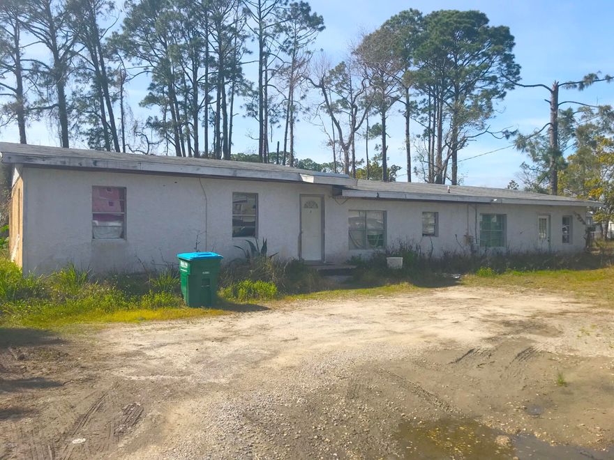 INCREDIBLE PRICE and AWESOME fix & flip or investment opportunity with this DUPLEX on a DOUBLE LOT in Panama City Beach! Fix it up or tear it down and build new homes - Your choice! This duplex has 2 units (A&B) - It is 2,100 sqft. (heated) and 2,352 sqft. (total). It is located right across Laurie Avenue from the Villas At Suncrest. Unit A is a 3 Bedroom / 2 Bathroom and Unit B is a 2 Bedroom / 1 Bathroom. The units are in need of repairs / renovation. The property is zoned multi-family and rent in the area spans from $800 - $1400 a month. =THE PROPERTY IS OCCUPIED - SO DO NOT DISTURB! Showing by appointment ONLY! A price and property like this RARELY comes along on Panama City Beach, so act quickly - IT WILL NOT LAST LONG!