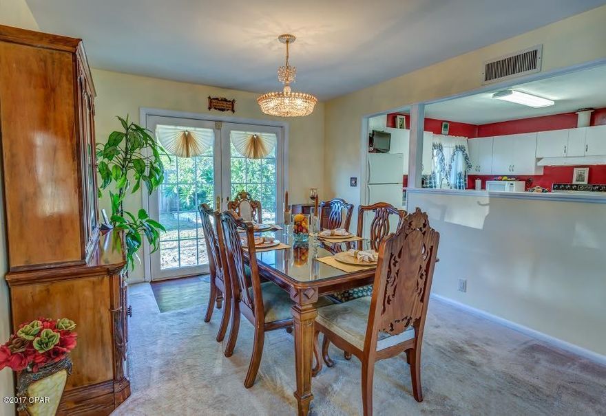 Sellers have been in love with this home year after year. This unique property has all the making of a wonderful primary or second home, offering 4/3 2180 sqft tri level open floor plan with finished basement, large wrap around corner lot located in a well established Woodlawn subdivision built in 1960. Meticulously maintained, pride of ownership really shows with this home. Enjoy family friendly design with living room, dining room & kitchen on the 1st level; 3 bedrooms, 2 full baths, walk in linen/utility closet with plenty of storage upstairs; basement  level with spacious family room, bedroom, full bathroom with walk-in shower and laundry room. Total electric, fenced backyard, conveniently located within 10 min to the beach. Zoned for A+ schools. Recent upgrades include but not limited to new roof (2006), upgraded HVAC system, et. Flood Zone X. 

All information contained herein is intended to be correct; however, buyer assumes complete responsibility for verification of all information.