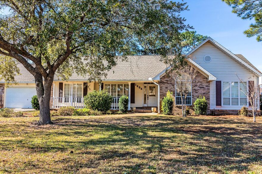 LYNN HAVEN-4 BED/3 FULL BATHS-ALL BRICK HOME in excellent condition offers easy access to restaurants, shopping, schools and hospital in Lynn Haven, Hwy 77, greater Panama City, Panama City Beach and TAFB *** INTERIOR:  Large volume family room with fireplace, kitchen with ample counter space and breakfast nook with bay window, formal living and dining room, den/florida room, large master suite with walk-in closet, three additional bedrooms, 3 full baths.  Exterior:  2 car attached garage, covered front and rear porch, storage building with 1 car garage door, irrigation well, fence.  Other features:  crown moldings, desk area, built-in, vaulted ceilings.  Buyer must verify all ages, sizes, and specs.