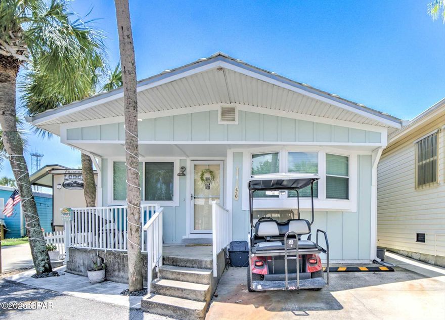 Check out this stunning 3 bedroom, 2 bath home with highly coveted outdoor space! Come enjoy paradise in this fabulous home that has recently been updated including: New LVP flooring throughout, new cabinets, quartz countertops, tongue & groove ceilings, Hardi siding, beautiful pavers and much more! This great home also has 2 nice outdoor areas, that create plenty of room for grilling and relaxing after a long day at the beach.  Home is being sold furnished and is turnkey ready for rental or make this your 2nd home or become a local and join us in paradise living your best life here in Venture Out!   It doesn't get better than this! Venture Out is a golf cart community that has exploded with popularity recently... With 300' on the beautiful pristine beaches of the Gulf of Mexico and 1,000' on the Grand Lagoon. Venture Out has something for everyone. With 2 pools, fishing pier, boat ramp, mini golf, & more