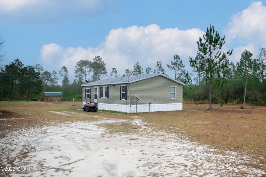 CURRENTLY UNDER CONTRACT, SELLER WILL CONSIDER BACKUP OFFERS Welcome to country living. 



This great 9 acre property, complete with a beautiful and well maintained 3 bed 2 bath 2017 Manufactured Home, is perfect for the hobby farmer or for someone that just likes to have more space than the city provides. You're a short drive from some of the best freshwater fishing that Florida has to offer and still within driving distance of the World's most Beautiful Beaches. This property has plenty of game for hunters or wildlife enthusiasts. Don't miss your opportunity to own a small slice of heaven on earth. Schedule your showing today.
