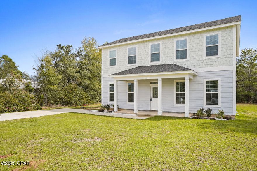 Introducing this splendid newly constructed 2,000 square foot residence, perfectly positioned to overlook the serene Boat Lake. 

This two-story gem is built with longevity in mind, featuring 2x6 construction in the walls and foam insulation in the ceiling, ensuring superior energy efficiency and structural integrity. The array of custom details includes soaring ceilings on the first floor, a built-in fireplace for cozy evenings, and an abundance of recessed and custom lighting fixtures. The grandeur is amplified by expansive crown molding and tall, elegant windows with transoms enhancing select doorways.

The dining space, enriched with captivating lake views, opens onto a generous covered back patio through a sleek glass door, ideal for alfresco dining or morning coffee. The kitchen is a chef's delight, boasting plentiful cabinetry and sprawling granite countertops. A covered front porch adds to the home's charm.

Ascend to the second level where the extensive master suite awaits, featuring a spacious closet within the ensuite bathroom, and offering stunning views of the lake. A glass door from the master suite opens to a private covered balcony, extending the living space outdoors.

Nestled at the end of a quiet cul-de-sac just off Shenandoah Boulevard and approximately a mile from Hwy 77, this home offers convenient access to Panama City, Chipley, and the World's Most Beautiful Beaches. Residents can also enjoy a leisurely round of golf at the nearby 18-hole course, suitable for all skill levels. This exceptional property promises a lifestyle of luxury and tranquility.