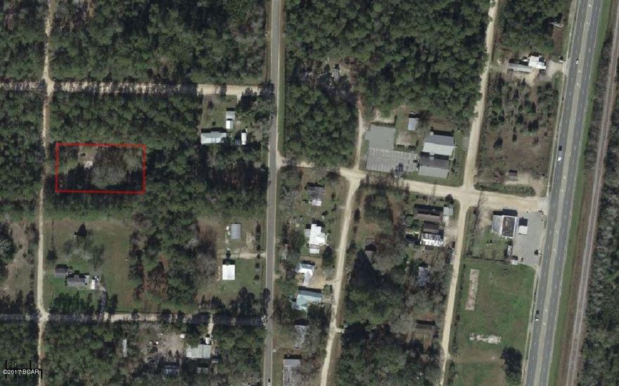 5-Lots of CLEARED land with oversized septic system (2 tanks) and power pole! Quiet area still only 3 blocks from HWY-231, and right pass Dollar General. SO much land! just one lot short of an acre (250x135). Build your dream home down the street from the crystal clear waters of Econfina creek ''Florida's Most Beautiful Canoe Trail''. Go visit the site and don't miss out on the wild Blackberries! The septic system was installed in 1999 and cleaned out in 2010 when the owners mobile home was removed. There was a short well (no pump) but needs a deep well. Only 40 Minutes from the International Airport this is a great investment property. Present Zoning R-2 Limited Multi-Family (Bay County). All measurements and info are approximate, taken from BCPA, please verify if important.