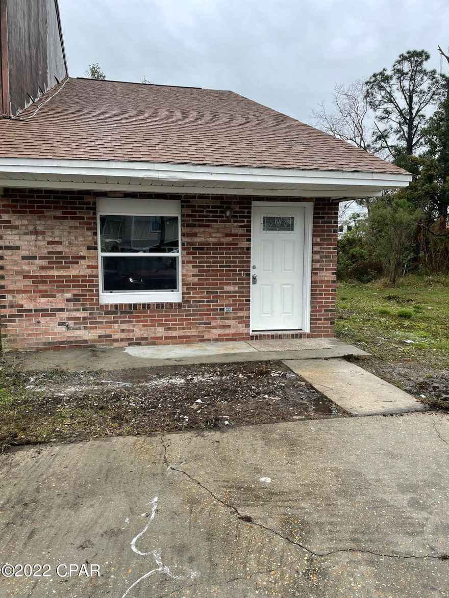 This would be a perfect rental for a great first home.  The unit has new carpet, paint and windows. Roof was put on in 2020.  A hurricane proof sliding glass door was installed!  Call today!