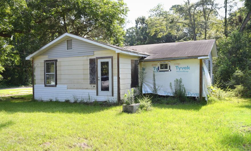 Great Investment Opportunity! This 3/2 home has been taken down to the studs and rehab has begun, with new subfloor, plumbing, insulation and electrical updates. Home is still in need of repair but would make a great rental or primary residence. Property is located inside the city limits.