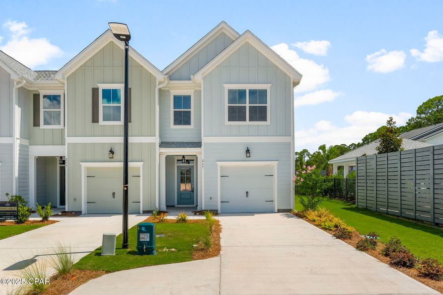 Welcome to Seagate at Clara, a new townhome community nestled in the heart of Panama City Beach, FL. This spacious two-story rental home features 3 bedrooms, 2 full bathrooms, and a convenient half bath. The charming board and batten exterior, covered entryway, and one-car garage make it as functional as it is stylish—perfect for storing all your beach essentials.

Inside, the open-concept layout includes a modern kitchen with a large island, ideal for both entertaining and everyday living. The elegant Owner's Suite is designed with comfort in mind, showcasing a generous walk-in closet and dual vanities.

Just steps from your door, enjoy the community pool featuring cabanas, lounge seating, and grilling stations—perfect for relaxing weekends. Pet lovers will appreciate the dedicated dog park, a favorite among residents.

Located in a prime area, you'll enjoy a short walk to local shopping, dining, and the stunning white sands of the Gulf of Mexico. Plus, you're just minutes from the popular Pier Park, offering endless entertainment and coastal charm.