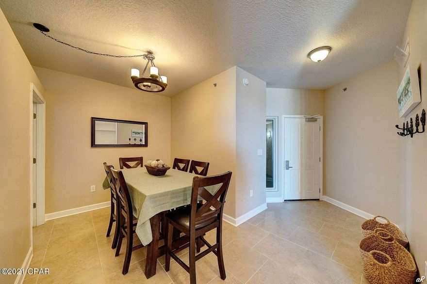 Fully furnished 2-3 bed, 3 bath condo with a bunk room and Gulf views at the desirable Shores of Panama Phase II. This condo truly sleeps and rents like a 4 bedroom with the private bunk room and additional sleeping area. This spacious condo is welcoming with an entry foyer that leads to the open living room and kitchen. The open living area creates a grand space with Gulf views to host family and friends without missing a beat. Immerse yourself in the Gulf views and sunshine on the private balcony. The kitchen is equipped with a breakfast bar, white appliances and a pantry. The spacious master bedroom features Gulf views and a private en suite with a shower/tub combo. There is a guest bedroom also with a full bathroom featuring a shower/tub combo. Large additional guest bedroom off the dining room. In addition, the bunk room has a private bathroom with a walk-in shower. Shores of Panama boasts a lagoon style pool, hot tub, an indoor pool, fitness room and conference room. This complex is located within walking distance of local beachfront restaurants that offer live music. Pier Park and Shipwreck Island are just a short drive away for a family friendly atmosphere. This condo is a must-see! TWO DEEDED PARKING SPOTS ON THE 8TH FLOOR FOR EASY ACCESS!!