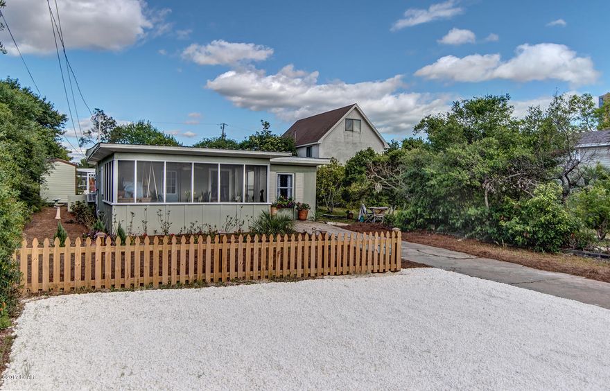 Recently renovated authentic 1960 beach cottage. Located on the desirable west end of Panama City Beach. Sitting on the first block close to the water, it is an easy  walk to the world’s most beautiful beaches. It has the original hard to find tongue and groove hardwood ceilings. The kitchen has been totally renovated. New window in the kitchen, sliding glass door and so much more are included in the renovations.It is on city sewage. It has a huge front screened in porch that can be easily enclosed if desired.  The yard has been landscaped. There is a beautiful scrub oak that is ideal for outdoor dining under the oak. The location cant be beat.. perfect for a nice stroll to the beach to visit Thomas Donuts and Carousel Food Mart..  Just 7 miles from Pier park and 30a!
