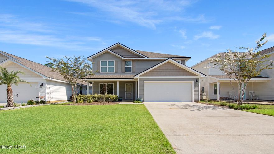 CURRENTLY UNDER CONTRACT, SELLER WILL CONSIDER BACKUP OFFERS. Welcome to your dream home in the gorgeous Fanning Bayou! This spacious 5-bedroom, 2.5-bath Elle floor plan has room for everyone — and then some. Step inside to a bright and open layout featuring a first-floor owner's suite for extra privacy, plus a flex space that's perfect for a home office, playroom, or whatever fits your lifestyle. The kitchen? It's a showstopper — a big island, tons of cabinets, and a huge pantry make it ideal for hosting or just keeping life organized. The living room is the heart of the home, featuring a custom built-in entertainment center that's both beautiful and functional. Head upstairs and you'll find a spacious loft/living area, four roomy bedrooms, a full bathroom, and the super convenient second-floor laundry. Out back is where the magic continues — a fully fenced yard, large paver patio, cozy firepit, and lush green grass make it perfect for BBQs, pets, or just relaxing. And let's talk location — Fanning Bayou offers a resort-style pool, shady lounge spots, an entertainment pavilion, gas grills, and plenty of green space. All this, surrounded by natural conservation areas but still close to shopping, dining, and the Panama City Airport. Only 22 mile to Tyndall AFB.