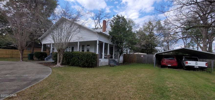 CURRENTLY UNDER CONTRACT, SELLER WILL CONSIDER BACKUP OFFERS.  5 BR 2 Bath Victorian Style home with 10' ceilings!  An inviting wrap around porch graces the front of the home. Hardwood floors have recently been refinished.  There is a circular driveway and covered parking. This house has a lot of character; built to last. Very spacious and with split bedrooms, 3 on one side of the house and 2 on the other. Central heat and air, HVAC system replaced in 2016, metal roof, new double insulated vinyl windows throughout. updated wiring and plumbing. For additional energy efficiency there are 3 propane gas heaters.  Property is totally fenced, with large shed, and plenty of room for a garden..  SELLERS ARE MOTIVATED SO BRING ALL OFFERS.