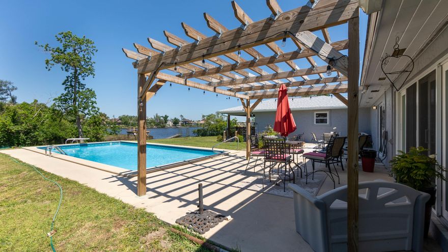 Beatty Bayou College Point 4-BR Waterfront Home on 1.7 Acres with New 80ft Fishing Pier/Dock, Boat Lift (Ready for a 12 x 30 covered Boat House) and comes complete with a 26,000 gallon Inground Pool.  Relax Pool Side or on private covered Porch and enjoy the view of Beatty Bayou. This home is built for entertaining, sunset viewing, and boating.  Don't overlook the Home's Oversized Bonus Room that would make the ultimate home office. All info/measurements approx., buyer to verify all info deemed important.  This split floor plan, 2-Primary Bedrooms with private baths and comes with a large dining area that could be a second living room and has a two car attached garage.  There is also a Whole Home Generator.  Move-In-Ready Home is on Well and Septic and has NO HOA. This 4 bedroom 3 bath (Two Master Suites with Private baths) has a lot more to offer so come see it today and see for yourself.  This Solid Block Built Home has Upgraded PGT Doors and Simonton Impact Resistant Windows valued at $40K Feb 2019, $20K Energy Star Roof Mar 2019, 6" Seamless Gutters, Room and Power outlet for a 40ft Motor Home, Plumbing upgrade 2014, New Pool liner 2017, and has Well and Septic system.  NO HOA fees and home is move in ready.  All info/measurements are approx., buyer to verify all deemed important.  Come see this home are realize the value and potential this property has with 1.7 Acres.   Contact your favorite Realtor today before this one gets away.