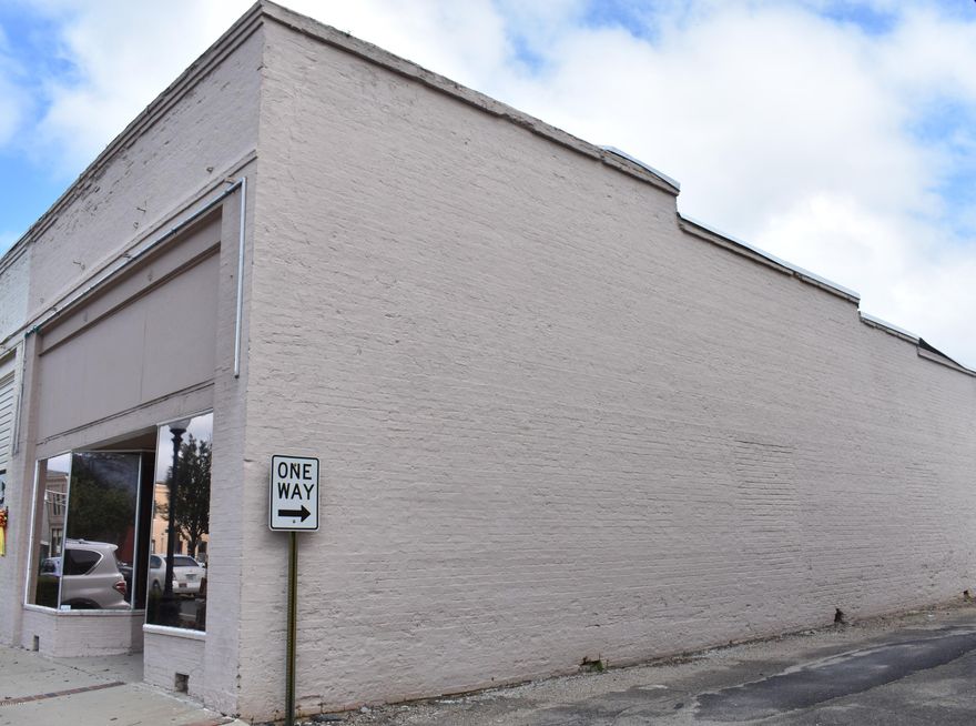 CURRENTLY UNDER CONTRACT- TAKING BACKUP OFFERS!!! The Downtown Area is growing!!!! Don't miss your opportunity to be a part of the growth taking place in downtown Chipley. There may be grants and low interest loans that are eligible to take advantage of. This AMAZING building would be the perfect solution for someone needing offices.  There are 8 offices to be exact with a nice reception/waiting area in the front.  Additionally, there is a bathroom, a separate room with a shower, a small break room area, and even a washer/dryer hookup.  If your business needs freight delivered, that's not a problem because the rear of the building has a freight door facing the alleyway.  This historical building has had many updates to include drywall, custom ceilings, light fixtures, laminate flooring.