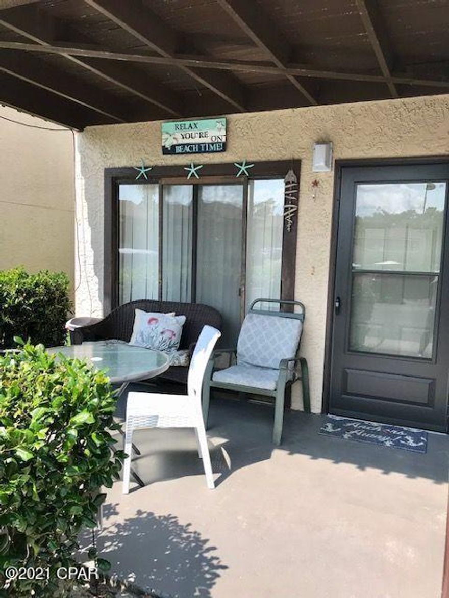 Great clean condo right across street from our sugar sand beach., upgraded paint and flooring, nice fully furnished features. Golf cart community, 3 pools and a hot tub, clubhouse with games and full kitchen, pool table, ping pong, darts, corn hole, book exchange, tv wifi, etc. Buyer to verify dimensions.  electric $100 ish, water $79 every other month, $800  ish yr insurance HO6 Hurricane/wind