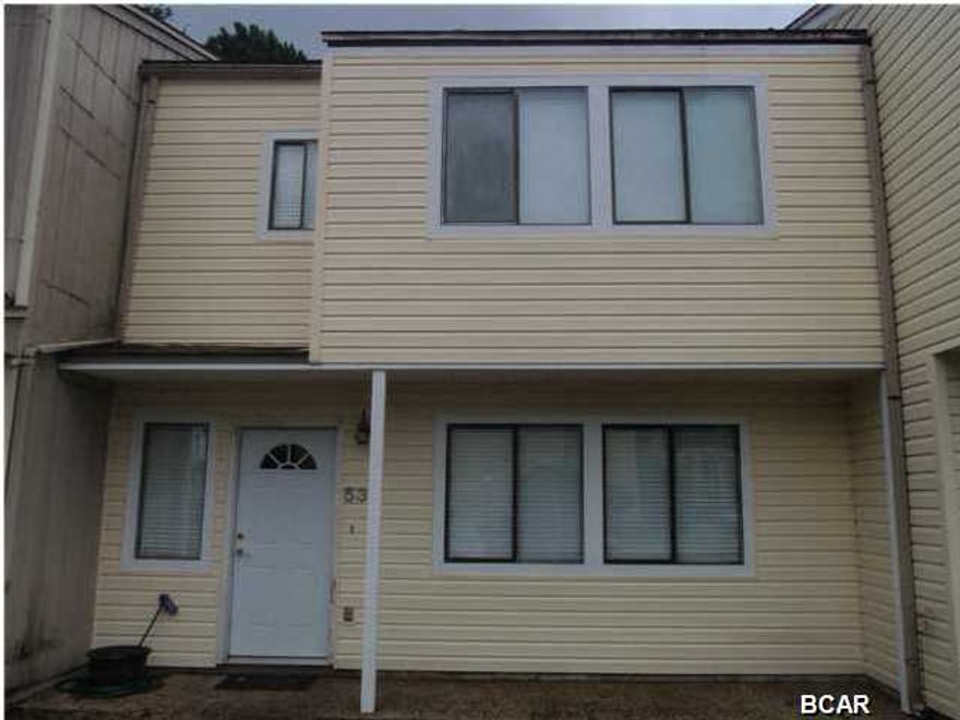 Great starter home or invsetment property.  Floor plan is open and layed out well with maximum use of space taken into consideration.  There is a spacious laundry room just off the kitchen.  All 3 bedrooms and two full baths are upstairs.  The back courtyard has a nice wooden deck and privacy fence just off the patio.  This home is located in the heart of Panama City with a short commuting distance to beaches, schools, shopping and dining.  (All measurements approx; please verify if important.)