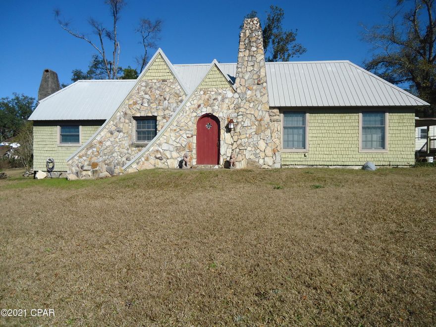 Walk to Wynn Street Park. Move in this 3 bedroom 2 bath home with special charm. This unique home is a must see. There's a king sized master bedroom area that has 2 small closets and a large walk in closet.  The kitchen has been updated.  It boasts a charming wood brick look flooring and plenty of cabinet space. There are 2 fireplaces in the house. You will have plenty of storage inside and outside the home. There's a nice storage attached to the carport and 2 other storage buildings.