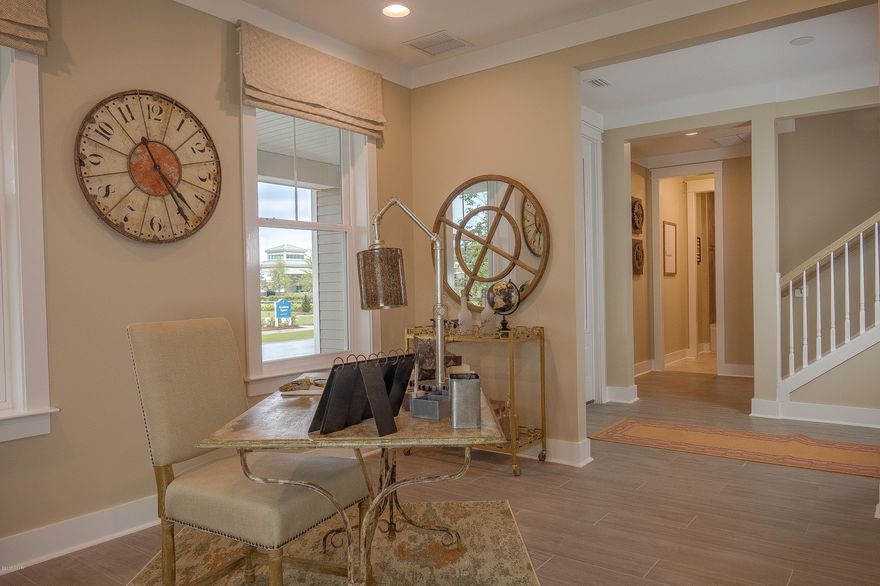 This home features the Marco I floor plan with Boatbuilder Elevation. This house is a new construction Model Home Example and not the actual house being built. SB home shown has custom and optional features. Please ask agent for standard feature list. Samuel Taylor homes are truly one of the best constructed homes in Bay County. We build our homes with 2x6 exterior studs vs other builders using 2x4's. Not only is it a stronger home, but this also allows us to put R-19 in the walls instead of R-13.  We also use R-38 in our ceilings vs R-30 like most builders. We insulate most of the interior walls to make a very quiet home. SS appliance package is standard along with brushed nickel faucets, security system, 8 ft. doors throughout, granite counters in kitchen and baths, raised vanities with with under mounted porcelain sinks, SS gas oven, oversized tiles, upgraded carpet with 8 lb. padding and much more.
   A craftsman style trim package adds to the character and uniqueness of our homes. Choose from 3 exterior elevations: Classic, Coastal, or Boat builder. Pick from traditional style garages or our detached garages with optional carriage home above, perfect for the college student, guests or in-law quarters.
   SweetBay offers biking and hiking trails, a boathouse to launch canoes, kayaks and paddle boards, a permitted marina, community pool, several parks, ponds, children's playground, planned township with a major grocery store and many shoppes. Everything is within a 5 minute walk or less.  University Academy is the center of this beautiful community. The Academy is the #1 school for math and reading for the Bay County District. Your children are priority for enrollment with purchase of a home. Currently there are over 1000 on the waiting list to get in to the school. Come see what everyone is talking about!