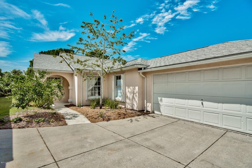 Welcome to the Prestigious Glades Community centrally located in PCB. This house is a A MUST SEE!! Located near the end of a cul-de-sac away from the neighborhood traffic. When you enter this well taken care of beautiful home you are greeted with breathtaking views of the Hombre Golf Course and the sparkling pool!! Lush landscaping including asparagus and a orange tree  just to name a couple. This amazing home boasts new hardwood flooring, new roof, new kitchen appliances, top of the line new HVAC system and skylights all in last 5 years. Electric curtains in master bedroom double window and quick closing hurricane shutters are a BONUS! Plenty of storage space as well as a full size laundry room with a wash sink.