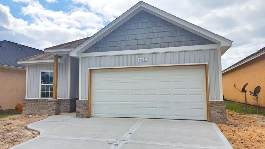 ***NEW BEACH CONSTRUCTION****You're literally around the corner from the beach (1/2 mile to Gulf), Hutchison Elementary, Surfside Middle, Arnold High Schools and all of the convenient shopping, entertainment and restaurants at Pier Park! This home features 3 bedrooms and 2 full baths a covered patio and 2 car garage, tile and carpet flooring, 9' ceilings, separate dining area, open floor plan and large kitchen island perfect for entertaining. Lots of natural light and located in X flood zone-All dimensions, measurements and other listing information should be verified if deemed important.