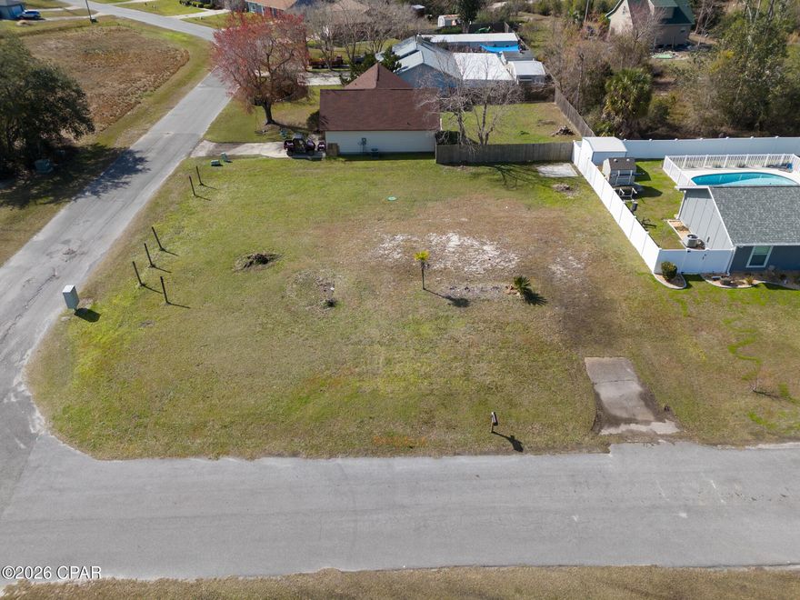 Beautiful and level corner lot with open views to the southwest to watch gorgeous sunsets from.  Quiet and peaceful neighborhood.  10 minutes to Tyndall AFB