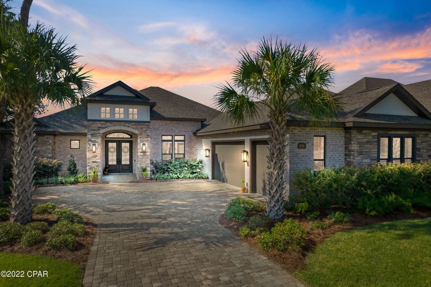 CURRENTLY UNDER CONTRACT, SELLER WILL CONSIDER BACKUP OFFERS. Stunning 3-bedroom 3 bath turn-key brick home with bonus room and beautiful water-views, located in desirable Cove Pointe. This custom designed Arthur Rutenberg home features platinum upgrades and is practically a new home, built in 2019. This exquisite home features a great room to enjoy family night, gourmet kitchen with a walk-in pantry and a gorgeous dining area. The luxurious oversized master suite features spacious his and hers walk in closets and great water-views. The master bath features a large glass walk in shower, dual sinks with quartz countertops and an elegant soaking tub. Enjoy the enclosed lanai with an amazing outdoor kitchen for entertaining while enjoying the tranquil water-views. Beautifully landscaped lawn.