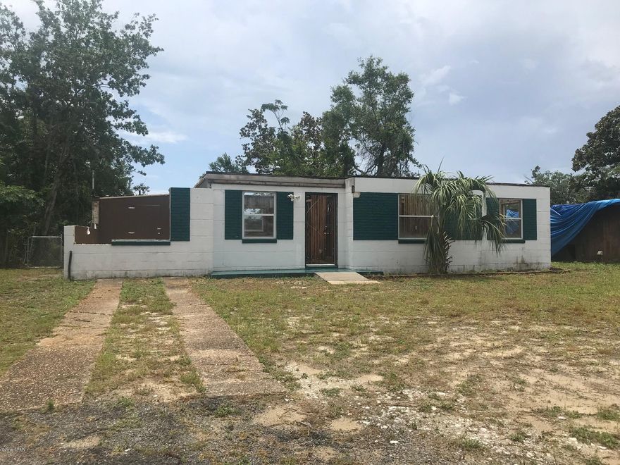 Attention investors!  This once charming 3 bedroom, 1 bath, block home, located in the heart of St Andrews, was hit hard by Hurricane Michael but could be beautiful once again. The home sits on a larger lot, 62'x118', and is located in close proximity to shopping, dining, and the marina, and is just a short 20 minute drive to the beautiful emerald green waters of the Gulf of Mexico. Seller has had the interior of the home gutted and the debris on the exterior cleaned out.  It's just waiting for someone to rebuild.