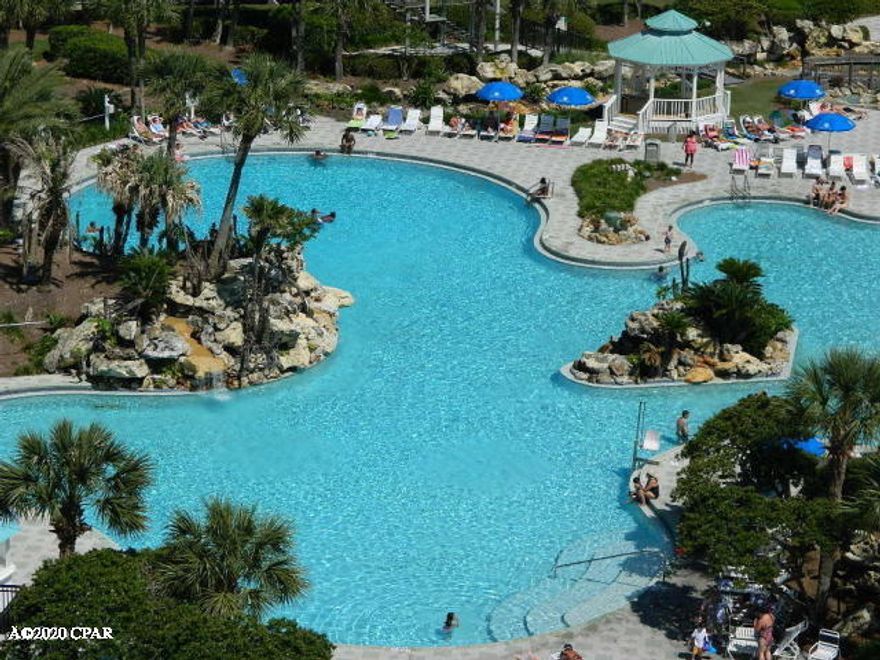 This 2 bedroom 2 bath Golf Villa has been totally updated with: Tile throughout condo, bathrooms have new tubs/showers, lights, mirrors, toilets, kitchen has a new dishwasher, refrigerator, washer, dryer, entire condo freshly painted, water heater, all new windows and sliding glass doors.  There are many other updates, as well.  The current seller has never rented.  This condo is spotless and the upgrades are MANY!  Over $35,000 in updates!  Edgewater Resort has 11 swimming pools, a beautiful  lagoon pool, executive 3 par golf course, tennis courts, 24 hours gated security and so much more!  You do not want to miss seeing this Golf Villa!  Information is believed to be correct, but should be verified by buyer.