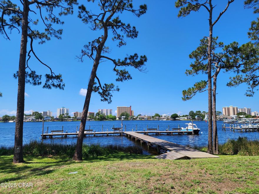 Palisades - Enjoy quiet evenings with a view of the lagoon off your balcony and back patio in this 2 bedroom, 2.5 bath condo.  This condo has been updated and features living/dining area, kitchen, 1/2 bath downstairs and 2 master suites upstairs.  Kitchen has a breakfast bar with bar stools. Unit has a carport with storage room,washer and dryer. Washer and Dryer are AS IS. Additonal parking available. Community features inground pool, tennis court and boat dock.  HOA provides water, sewer, garbage and basic cable (Xfinity).  HOA conducts their own background check.1 small pet negotiable with $250 pet deposit/$50 pet fee. $25 month pet rent.