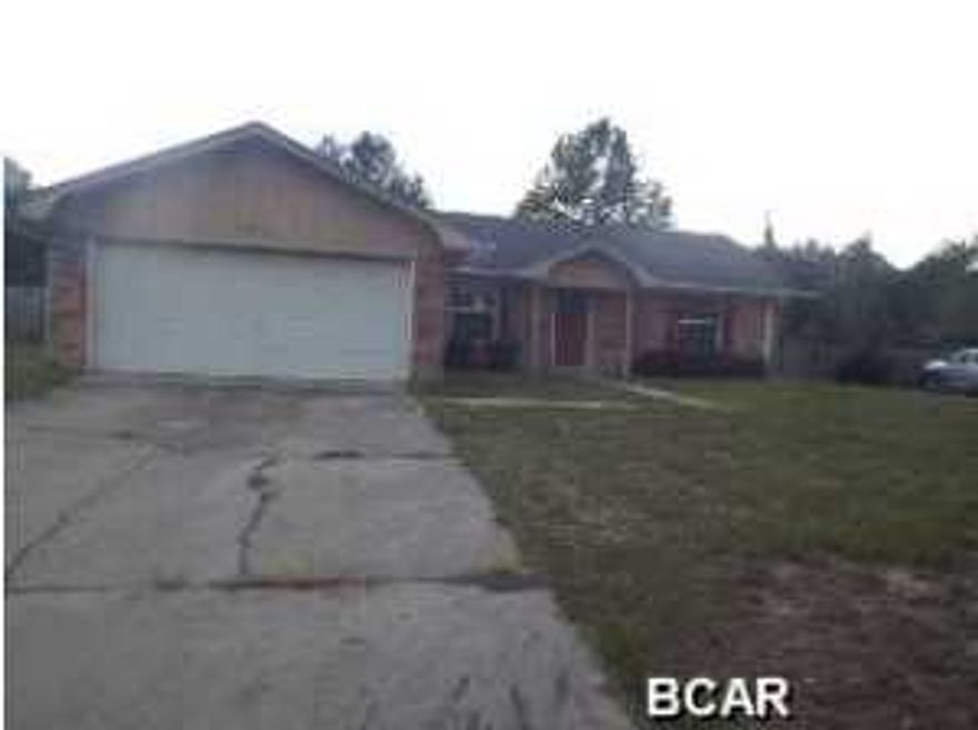 Brick/Vinyl 3 bedroom 2 bath split floor plan home with garage offered as is. The house sits on a half acre lot and is within walking distance to a fresh water boat launch on Deer Point Lake. The home has a large living room, with a wood burning fireplace and has a fenced back yard is fenced with plenty of room for a pool or garden.