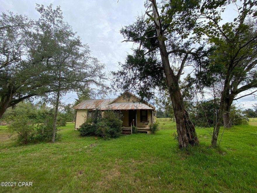 Step back in time to this farmhouse that has lots of potential!  This 3 bedroom, 1 bath home sits in a peaceful country setting.  The home is mostly original construction so it needs updates.    There's a total of 3 acres - about 1 acre is on the other side of Waterberry Lane with the home sitting on about 2 acres.  Come bring this home to life!