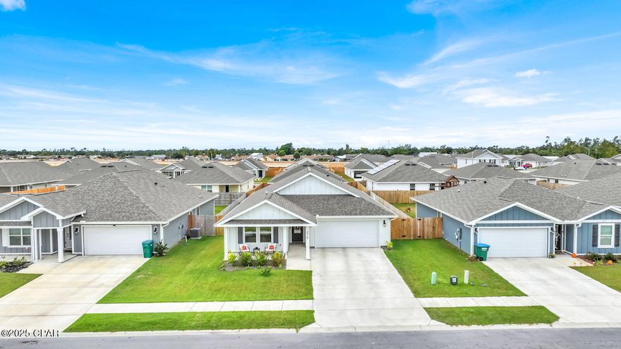 Get a 5.99% interest rate with preferred lender. This beautifully maintained home stands apart from the typical new builds in the neighborhood thanks to its full Hardie Board exterior, a premium upgrade valued at $20,000 that adds exceptional durability and long-term peace of mind.

Inside, the home features a series of thoughtful upgrades designed to enhance both style and convenience. A recirculating heat pump provides near-instant hot water, while the kitchen includes a filtered water spout and a built-in hidden trash system. The sellers also upgraded the door knobs, kitchen hardware, and sinks to create a more polished, elevated feel throughout the home.

Smart-home features include smart switches, a smart garage door, Nest cameras, an Aqara smart lock and video doorbell (Apple Home compatible), and a WiFi-controlled, four-zone irrigation system. The home also includes custom closet built-ins and organizers, adding function and storage to multiple rooms. Luxury vinyl plank flooring was added in the primary suite for both style and durability.

Additional exterior highlights include Govee roofline lighting, gutters, and a termite bait system for added protection. The fully fenced backyard is ready for weekend enjoyment and features a playground with plenty of space to personalize.

Located in the highly desirable Park Place community, residents enjoy sidewalk-lined streets, a neighborhood pool, playground, and BBQ area, creating a warm and family-friendly environment. Conveniently situated near shopping, schools, parks, and Tyndall AFB, this upgraded home combines comfort, efficiency, and community living in an ideal location.