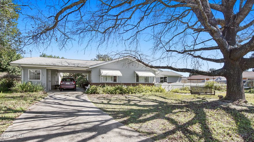 'CURRENTLY UNDER CONTRACT, SELLER ACCEPTING BACKUP OFFERS. WALK to the Gulf from this adorable Beach House on a large double property walking distance to Pier park. This home has three bedrooms one office and two full bathrooms with an open kitchen/living area. There is also a finished large workshop with an attached Greenhouse. Covered parking. Needs some TLC Must see !

Measurements are approximate, verify if important.