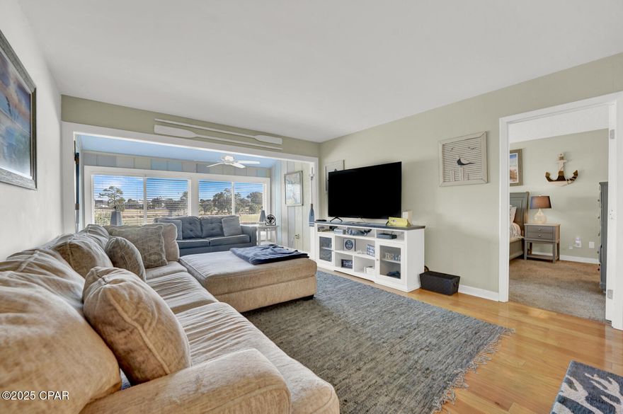 SELLER FINANCING AVAILABLE Welcome to the tranquil, resort-style community of Harbour Villas, located in the highly desirable Bay Point neighborhood. This spacious, beautifully renovated one-bedroom, one-bathroom villa overlooks the state-of-the-art marina and picturesque golf course, offering the perfect blend of comfort, style, and convenience. Nestled within a gated community, this second-floor unit features a bright and airy living space with hardwood floors throughout, new windows, fresh paint, and a new water heater. The living room boasts a stunning wall of windows that flood the space with natural light, creating a warm and inviting atmosphere with great water views. The bedroom includes an added sitting area, two closet spaces, and a vanity and dressing area for additional functionality and charm.Located just steps from the marina and within walking distance to the Nicklaus Golf Course, this villa is ideal for guests seeking a peaceful retreat, fishing, or a round of golf. With ample seating areas and plenty of natural light, the space is perfect for relaxation and entertaining.This property is also an excellent primary residence option, being just minutes from Panama City Beach, shopping, and the Navy Base. Whether you're seeking a serene getaway or a lucrative rental opportunity, this fully furnished condo offers everything you need. Don't miss out on this exceptional opportunity—schedule your showing today!