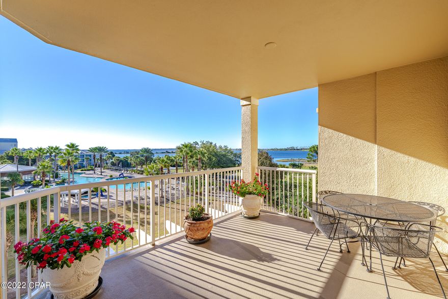 CURRENTLY UNDER CONTRACT, SELLER WILL CONSIDER BACKUP OFFERS' This spacious corner unit  is located in the Grand Residence of the gated Bay Point community. The floor plan features split bedrooms (each with own full bathroom),  has LVP flooring throughout and an open kitchen,dining and living area. The Kitchen has  beautiful counters & cabinets and stainless steel appliances. This end unit has a large balcony accessed from the living area and master suite featuring  270 degree views revealing Shell island  to Saint Andrews St park. Unit  has  a private 7x9 heated & cooled storage unit and  a covered parking space. This small complex is brilliant! Amenities roving security, fitness room, pool, hot tub, covered recreation area, fireplace fire pit summer kitchen, pool table,Marina & Golf cou ping pong.