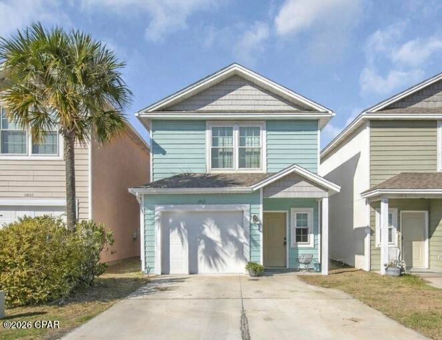 Welcome to this beautifully maintained home in the desirable Causeway Manor community, ideally located on the east end of Panama City Beach just off Thomas Drive. Offering approximately 3 bedrooms and 2.5 bathrooms, this two-story residence features a functional, open-concept layout designed for comfortable everyday living and easy entertaining. The main living area flows seamlessly into the kitchen and dining space, creating a bright, inviting atmosphere. The kitchen is equipped with modern finishes, including stainless steel appliances and durable countertops, while the spacious living room provides plenty of natural light. 
Upstairs, the bedrooms offer privacy and comfort, with a primary suite that includes its own bath. Additional highlights typically include a single-car garage, low-maintenance lot, and a private backyard space. 

Located just minutes from the Navy base, shopping, dining, and schools, this home is also a short drive—or golf cart ride—to the white-sand beaches, marinas, and St. Andrews State Park. Enjoy the convenience of coastal living in a quiet, well-kept neighborhood close to everything Panama City Beach has to offer.