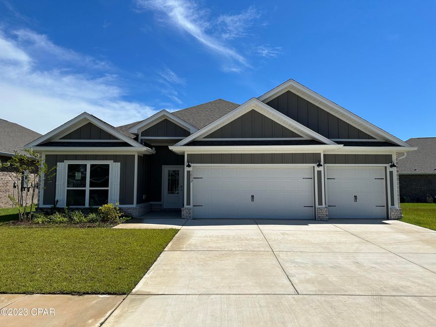 The Destin is a spacious one-story, four-bedroom, three-bathroom, three-car garage floorplan. As you enter this home you are covered by a small front porch and walk into a foyer. 

This is a nice Split floor plan with the home's first two guest bedrooms and one guest bathroom off of the foyer. If entering through the garage, you will walk directly into a spacious laundry room and then into the home's kitchen and living room area that has a nice Open Concept, with the center kitchen island with a sink, which is very convenient for watching TV and entertaining your guests while cooking. The home has 9' ceiling throughout the house with lovely trey ceilings in the large Living room and Main Bedroom. 
The kitchen has an upgraded Gourmet kitchen, meaning it comes with a separate stainless-steel cooktop/wall oven/ wall microwave/hood vent and a dishwasher. There is also a large walk-in Pantry and you have cabinets on both sides of the kitchen island for extra storage as well. 
Towards the back of the home are the third guest bedroom and the guest bathroom. The Main first bedroom is located away from all of the bedrooms, in the back corner of the house, giving you more privacy. 
Main Bathroom has a double vanity, walk-in closet, a separate Garden tub and a separate Shower with a Glass door. There is also a Window in the Main Bathroom, giving you plenty of natural light!
All countertops in the kitchen and bathrooms are granite, flooring in all the main and wet areas is the Luxury Vinyl Plank and there is carpet in all bedrooms. 

The Lot is 0.16 of an acre giving you a spacious Back yard. 
The driveway is large, considering it is a 3-car Garage home, giving you plenty of parking space. 
Sod is done for the whole lot, front, back and sides, also with some nice landscaping with shrubs upfront. 

AREA:
Hodges Bayou community is located off of HWY 77A (also called HWY 2321), which is conveniently located between 2 major Highways 231 that can lead you to Panama City, Bayou George, Callaway, Youngstown, Fountain, Cottondale and Marianna, and HWY 77, which can lead you to Lynn Haven, Panama City, Panama City Beach, and also Vicksburg, Sunny Hills, Econfina Creek, and Chipley. 
Main grocery stores are just 11 minutes' drive (4.3 miles), however there are also plenty of convenient stores within 4 minutes' drive as well. Northwest Florida Beaches International Airport is just around 19 minutes' drive (15 miles), 20 minutes (12 miles) to Downtown Panama City, 18 minutes' drive (10 miles) to Gulf Coast Medical Center, 25 minutes' drive (11 Miles) to Sacred Heart, 30 minutes' drive (12 miles) to Tyndall Air Force Base,  
Panama City Beach is just around 35 minutes' drive, Econfina Creek is just around 30 minutes' drive, however there is a public Boat Ramp with a little local Beach rest area with picnic tables and a playground right off of HWY 77A, which is just 1 minute drive! The community itself has its own Playground area for your kids, which is conveniently located further away from the main Highway. 
Lynn Haven Bayou Park and Preserve is located just around 3 miles away, that has gorgeous nature trails, playground areas and a nice beach as well!