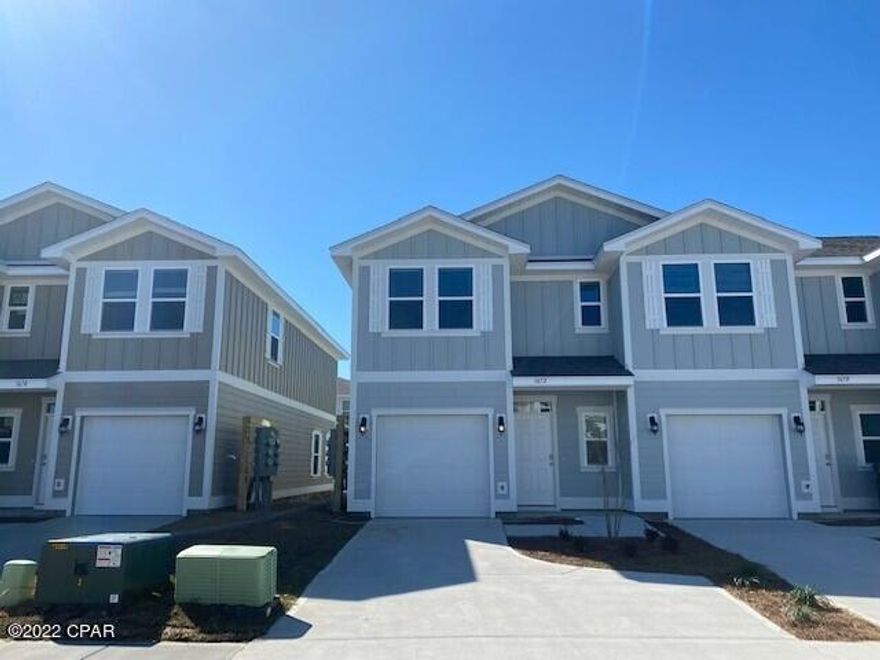 The Palm floor plan is a 3 bedroom, 2.5 bath townhome. As you enter, the long entry leads to an open living and dining area. The kitchen has a breakfast bar and is an open concept. This plan features a single car garage and all bedrooms are on the second level. Bedroom 1 has a large bath with walk-in shower and glass door as well as a walk-in closet. The additional bedrooms are situated at the back of the townhome as well as a full bath and laundry area. This is our newest townhome community and it is centrally located in Lynn Haven. ** Up to $10k in closing costs when using seller preferred lender with contracts executed by 1/23/2022 closed no later than 2/23/2022. Buyer does not have to use the preferred lender, only to receive closing cost promotion. ** This home comes standard with a Smart Home Technology package which includes a KwikSet keyless entry, Skybell doorbell, automated front porch lighting, an Echo Dot device, and Quolsys touch panel which can be integrated to control your lighting, thermostat, front door and so much more. 

This home is being constructed with the Zip Sheathing system, providing greater protection than a traditional housewrap from damages due to wind, rain, and extreme weather. A builder 10-year structural warranty is also included.

Pictures may be of similar, but not necessarily of subject property, including exterior and interior colors.