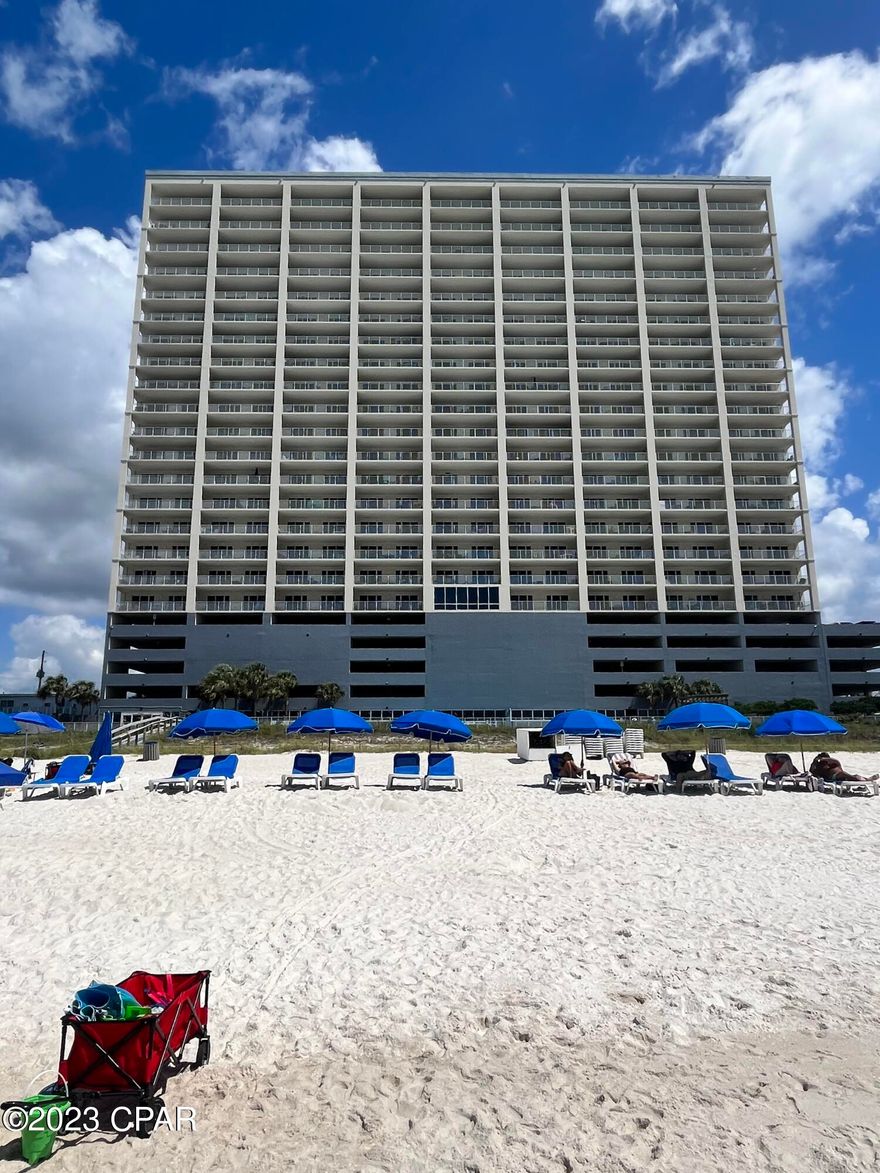 **ARGUABLY THE BEST DEAL ON THE BEACH!! SELLER WILL FINANCE WITH ONLY 20% DOWN ON A 30 YEAR AMORTIZATION WITH THE BALLOON PAYMENT NOT DUE FOR 5 YEARS...AND THE BEST PART...6% FIXED RATE!!! With the 30 year fixed hovering at 8% you are saving hundreds of dollars a month in payments. And let's not forget some of THE LOWEST condo fees on the beach(only $525 a month!!) 2022 rental figures were $61,900 net rental after taxes and cleaning fees. This 2bd, 2ba unit has been recently updated by the original owners and is in immaculate condition. Upgrades and updates include: Custom granite countertops, marble and granite countertops in bedrooms, new stainless steel appliances, new flat screen TV's, recently replaced air conditioner and hot water heater, vinyl plank flooring, tiled 8' X 10' balcony, newer full sized washer and dryer, and very high end designer furniture to include the leather living room sleeper and chairs. Unit paint was touched up the week it was listed. One of only a handful of gulf front complexes with garaged under building parking. Park and go straight into your unit...no need to walk across the street. Complex offers a fitness center as well as both an outdoor pool and hot tub and indoor heated pool for those cold winter months...both of them :-) And you are less than 5 minutes from Pier Park. This unit will not last long...so call me ASAP! All information is approximate and should be verified by buyers if important