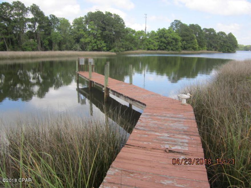 WATERFRONT TOWN HOME WITH DOCK UNDER 140 K....WOW !!!!! Navigate through East Bay to Shell Island or The Gulf of Mexico in just 15 minutes or fish right off of your own dock! Sit on your covered balcony in the mornings, drinking coffee and watching the Sunrise or evenings, sipping a Margarita & watching the Sail Boats, Dophins or Wildlife. NEW ROOF...Home in great condition. No great upfront expenses. Owner will consider participation in Costs of Closing & provide a Home Warranty with a FULL PRICE offer. Don't hesitate....this is a good one !! (Note: all room dimensions need to be verified )