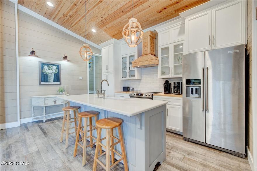 under contract with a up to 72 hour kick out clause. Don't miss your opportunity to own premier location in Venture out with scenic views of the beach and venture out beachside pool. Ones on this side are rare to come available. The large back patio with expansive views features outdoor kitchen with built in grill. When head inside this 2 bedroom, 2 bath home has been totally remodeled. Open concept living, dining, and kitchen. Chef's kitchen features stainless appliances, oversize farmhouse sink, new cooktop/oven and custom designed vent hood. Don't miss your chance to own your piece of paradise. (property coming with golf cart!)