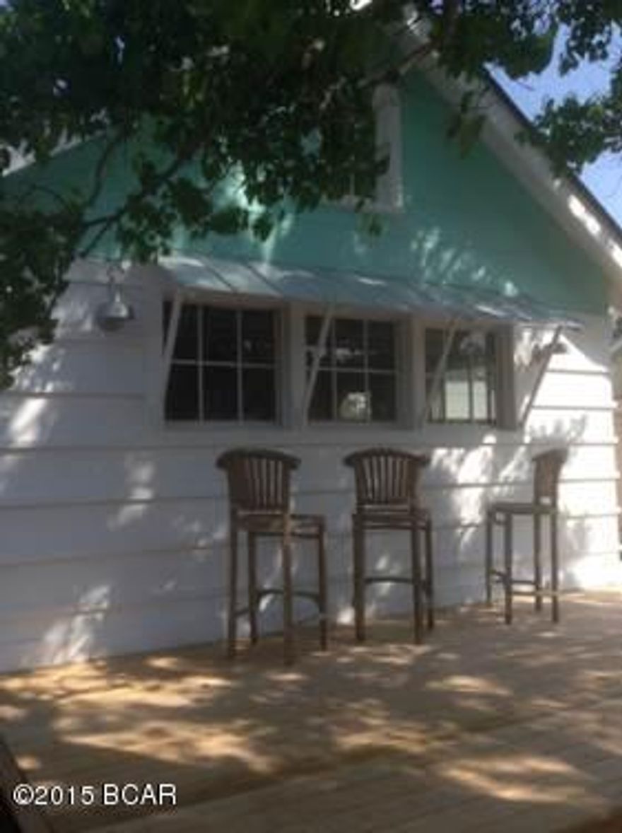 One of the best Remodeled Cottages on the Beach!  2 Bedroom/2 Bath with heated & cooled Bunk room.

Wonderful open kitchen and living room giving both a sense of light and openness and cottage coziness all at the same time – crazy I know! This tastefully remodeled cottage has kept its original character but been bought up to date with the creative use of modern materials and style. The kitchen has new stainless steel appliances, cherry butcher block counter tops and original unique inward opening windows, the living room has a wood burning fireplace and is being sold with living room furniture. At the rear of the house is the laundry room with outside shower. They say a picture is worth a thousand words so look at the photos and let them speak to you about this great home. If important the Buyer should verify all measurements. One of Seller's managing members is FL licensed Realtor