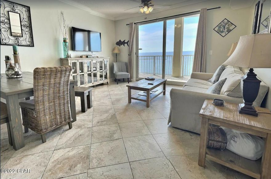 This awesome 3-bedroom, 3-bathroom condo features an oversized, almost 300sqft balcony. Ocean Ritz 1102 is being sold fully furnished and ready to rent. The unit offers breathtaking views of the gulf from the living area and master bedroom. The unit offers quality furnishings and has been well maintained. Crown molding through-out the living areas of the unit. The master bedroom is gulf front and has direct access to the balcony. The second bedroom features a queen bed and ensuite bathroom. The third bedroom features a full bed, a set of bunk beds, and an ensuite bathroom. The unit has porcelain tile through-out. The kitchen has granite counter tops and plenty of cabinet space The unit also has a new A/C. Ocean Ritz is a low density building with only 63 units in the building with only 3 units per floor. The complex is currently installing new elevators and this has already been paid in full by the current owners. The on-site amenities include a Gulf front pool, hot tub, exercise room and outdoor grills. This unit comes with a designated parking spot directly under the building.