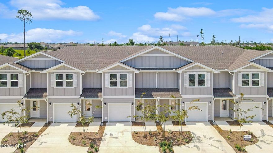 Welcome to Jake's Landing townhomes. This exterior unit located at 1729 Jakes Drive offers 3 bedrooms and 2.5 bathrooms and a single car garage. On the outside of these units, you will see quality Color-Plus Hardie Board exteriors, complemented by prairie-style doors and dimensional shingles with a 30-year warranty. Convenience meets security with steel garage doors equipped with openers, weatherproof outlets, hose bibs, and a fully sodded yard where cleared. As you enter inside, you will feel right at home with beautiful EVP flooring at your feet, leading you to the open living room and kitchen or the spacious upstairs. In the kitchen and bathroom, you will find gorgeous granite countertops, white cabinets with brushed nickel hardware, and a full stainless steel appliance package including a stove, microwave, dishwasher refrigerator, washer and dryer. Stay cool with energy-efficient cooling and heating systems, Low-E insulated windows with screens, and ceiling fans in the living room and primary bedroom as well as blinds installed throughout the home. Each home comes with modern Smart Home technology including a Skybell doorbell, Honeywell thermostat, and Smart Switches. An additional convenience is that landscaping and lawn maintenance is included. Rest assured with a one-year builder's warranty from DR Horton and a ten-year structural warranty through RWC. Located in the lovely city of Lynn Haven, Florida, you are not far from great food, shopping, schools, hospitals, and more. These homes offer easy access to Tyndall Air Force Base (just a 20-minute drive) and the world-famous white beaches of Panama City Beach (20 minutes away).